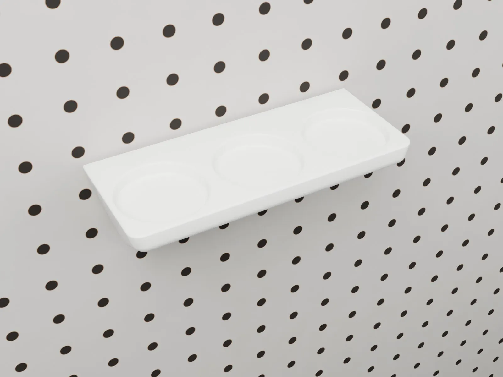 Render of the empty rack on pegboard, showing the three round countersinks across its top, each with a flat bottom