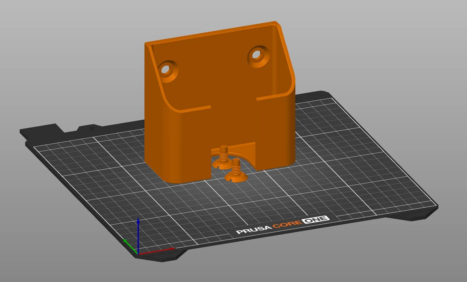 The holder and two screws on the Prusa CORE One build plate in PrusaSlicer, the holder standing upright with the screws on their heads in front